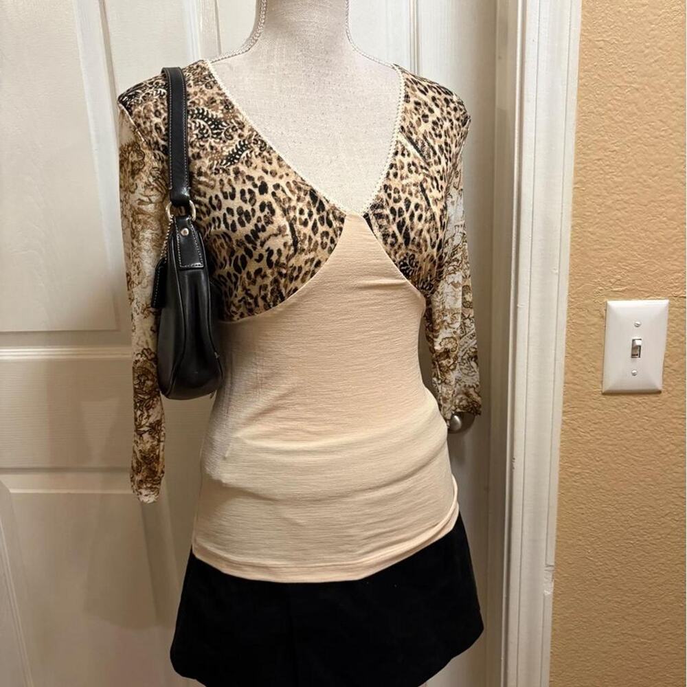 Clio Leopard print blouse with floral quarter sleeves. Small/medium fit